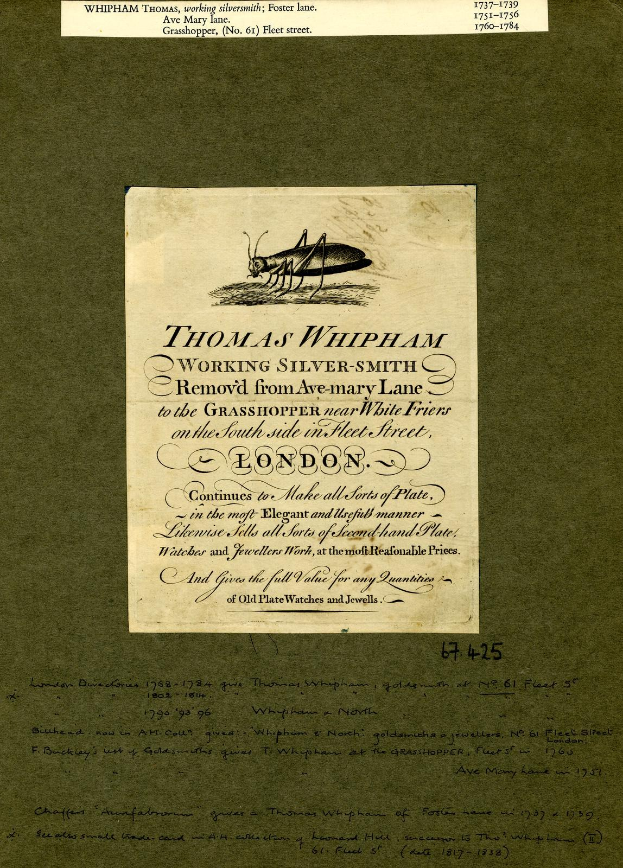 Ein abgegriffenes Buch mit einer Illustration eines Grashüpfers auf dem Cover und gedrucktem Text auf den Seiten.