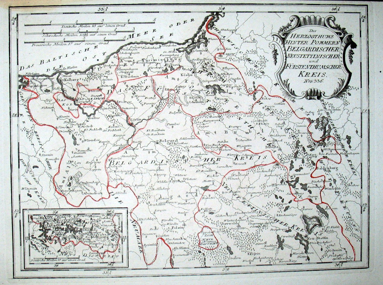 Alte Deutschlandkarte mit einer roten Linie darauf, auf Papier gedruckt mit handgeschriebenem Text.