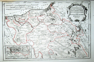 Alte Deutschlandkarte mit einer roten Linie darauf, auf Papier gedruckt mit handgeschriebenem Text.